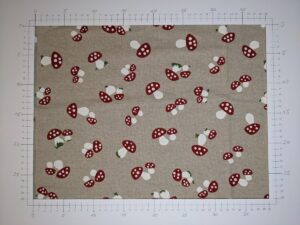 A heavy fabric with plants pattern, white/red on beige (ID: FH032)