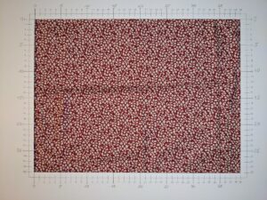 A light fabric with plants pattern, white on red (ID: FL043)