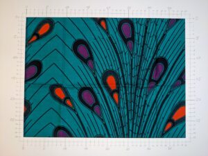 A light fabric with objects pattern, orange/purple on teal (ID:FS049)